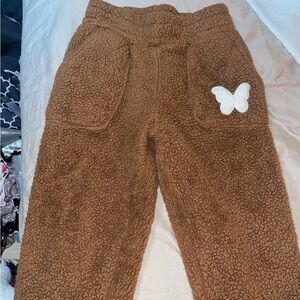 Fuzzy brown butterfly sweatpants